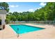 Community pool with a wading pool, lounge chairs, and a nearby clubhouse at 494 Battey Dr., Myrtle Beach, SC 29588