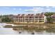 Multi-story waterfront condo building with views of the marsh and natural surroundings at 501 Maison Dr. # F-1, Myrtle Beach, SC 29572