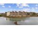 Exterior of multi-level condos backing up to a peaceful body of water at 501 Maison Dr. # F-1, Myrtle Beach, SC 29572