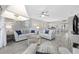 Open living space with two sofas, a ceiling fan, and views to the kitchen and dining area at 501 Maison Dr. # F-1, Myrtle Beach, SC 29572