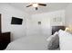 Bedroom featuring a flat-screen TV and a comfortable bed with decorative pillows at 5064 Wavering Place Loop, Myrtle Beach, SC 29579