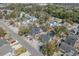 An aerial view of a neighborhood showcasing tree-lined streets and various home styles at 508-B Rosemary Ln., North Myrtle Beach, SC 29582