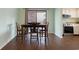 Dining room with a table and chairs. Kitchen is visible in the background at 508-B Rosemary Ln., North Myrtle Beach, SC 29582