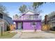 Charming purple home featuring a second-story balcony and well-maintained landscaping and inviting curb appeal at 508-B Rosemary Ln., North Myrtle Beach, SC 29582