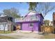 Charming two-story home with a delightful balcony, painted in a vibrant purple at 508-B Rosemary Ln., North Myrtle Beach, SC 29582