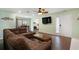 Spacious living room with wood-look floors and a view into the kitchen at 508-B Rosemary Ln., North Myrtle Beach, SC 29582