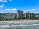 Wide aerial view of complex on a beach, showing the property’s coastal location at 5308 N Ocean Blvd. # 1003, Myrtle Beach, SC 29577