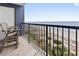 Relax on the tiled balcony with seating and unobstructed views of the beach and ocean at 5308 N Ocean Blvd. # 1003, Myrtle Beach, SC 29577