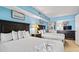 Bedroom with two beds, beach-themed décor, and mirrored closet doors at 5308 N Ocean Blvd. # 1003, Myrtle Beach, SC 29577