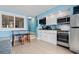 Well-lit kitchen with stainless steel appliances and granite countertops at 5308 N Ocean Blvd. # 1003, Myrtle Beach, SC 29577
