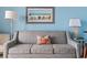 Cozy living room with ocean-themed decor and furnishings at 5308 N Ocean Blvd. # 1003, Myrtle Beach, SC 29577