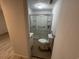 Clean bathroom with a glass door shower and accessibility handrails at 538 Oatland Rd., Georgetown, SC 29440