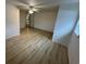 Well-lit bedroom with ceiling fan and modern hardwood flooring at 538 Oatland Rd., Georgetown, SC 29440