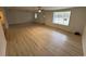 Open living area with new laminate floors and large window for natural light at 538 Oatland Rd., Georgetown, SC 29440