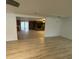 Spacious living room with hardwood floors and brick fireplace feature at 538 Oatland Rd., Georgetown, SC 29440