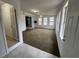 Spacious living room with carpet and lots of windows at 538 Oatland Rd., Georgetown, SC 29440