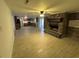 Spacious and open floor plan with great room featuring a brick fireplace at 538 Oatland Rd., Georgetown, SC 29440