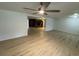 An airy living space with new laminate floors and neutral paint tones, ready for personalization at 538 Oatland Rd., Georgetown, SC 29440