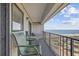 Condo balcony with chairs and ocean view at 5905 S Kings Hwy. # 810-C, Myrtle Beach, SC 29575