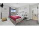 Inviting bedroom with bedside tables, balcony access, and neutral decor at 5905 S Kings Hwy. # 810-C, Myrtle Beach, SC 29575