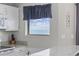 Bright kitchen featuring granite counters, white cabinets and stainless microwave at 5905 S Kings Hwy. # 810-C, Myrtle Beach, SC 29575