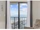 Ocean view through sliding glass door with curtains at 5905 S Kings Hwy. # 810-C, Myrtle Beach, SC 29575