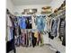 Spacious walk-in closet with ample storage, featuring clothing racks and shelves, well-organized and brightly lit at 621 Cottontail Trail, Myrtle Beach, SC 29588