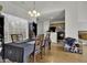 Inviting dining area with ample natural light, stylish furniture, and an open layout, perfect for gatherings at 621 Cottontail Trail, Myrtle Beach, SC 29588
