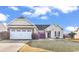 Charming single Gathering home with an attached two-car garage and well-manicured lawn at 621 Cottontail Trail, Myrtle Beach, SC 29588