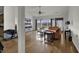 Bright living room featuring vaulted ceilings, wood floors, and large windows at 621 Cottontail Trail, Myrtle Beach, SC 29588
