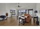 Bright living room featuring vaulted ceilings, wood floors, and large windows at 621 Cottontail Trail, Myrtle Beach, SC 29588
