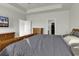 Spacious main bedroom features a trey ceiling, neutral walls, and connecting en suite bath at 621 Cottontail Trail, Myrtle Beach, SC 29588