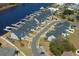 Aerial view of the property showcasing the community, waterway access, and manicured landscaping at 622 Lorenzo Dr. # 622, North Myrtle Beach, SC 29582