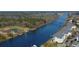 Scenic aerial view of the waterway highlighting waterfront homes and the lush surrounding landscape at 622 Lorenzo Dr. # 622, North Myrtle Beach, SC 29582