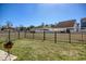 Fenced backyard with lush grass and views of the surrounding neighborhood at 622 Lorenzo Dr. # 622, North Myrtle Beach, SC 29582