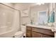 Cozy bathroom with a granite vanity, white shower, and modern fixtures at 622 Lorenzo Dr. # 622, North Myrtle Beach, SC 29582