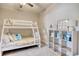 Comfortable bedroom with a bunk bed, bookshelf, and inviting decor at 622 Lorenzo Dr. # 622, North Myrtle Beach, SC 29582