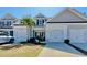 Charming townhome with a well-manicured lawn, attached garage and a welcoming entrance at 622 Lorenzo Dr. # 622, North Myrtle Beach, SC 29582