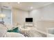 Cozy living area with comfortable seating, a TV, and neutral decor at 622 Lorenzo Dr. # 622, North Myrtle Beach, SC 29582