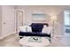 Comfortable living area with a cozy futon, decorative painting, and inviting decor at 622 Lorenzo Dr. # 622, North Myrtle Beach, SC 29582