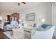 Comfortable living room open to kitchen with white walls, coastal decor, and comfortable seating at 622 Lorenzo Dr. # 622, North Myrtle Beach, SC 29582