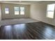 Bright, airy living space featuring a mix of carpet and wood flooring plus abundant natural light at 643 Castillo Dr., Loris, SC 29569