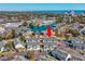 Aerial view of a coastal residential neighborhood with a pond and mature trees at 701 1St Ave. S # 32C, North Myrtle Beach, SC 29582
