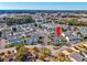 Bird's eye view of townhomes in a residential area with a street intersection at 701 1St Ave. S # 32C, North Myrtle Beach, SC 29582