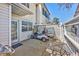 Fenced-in backyard patio with a golf cart, outdoor seating, and access to the house through a glass door at 701 1St Ave. S # 32C, North Myrtle Beach, SC 29582