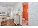 Entryway featuring tile floors, a half-bath, and access to the kitchen and living areas at 701 1St Ave. S # 32C, North Myrtle Beach, SC 29582