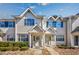 Charming townhouse featuring traditional siding, colorful shutters, and well-maintained landscaping at 701 1St Ave. S # 32C, North Myrtle Beach, SC 29582