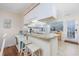 Kitchen with granite countertops, stainless steel appliances, and white cabinetry at 701 1St Ave. S # 32C, North Myrtle Beach, SC 29582