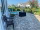 Relaxing backyard patio with seating and well-maintained landscaping, perfect for outdoor living at 808 Yauhannah Dr., Little River, SC 29566