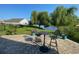 Relaxing backyard patio area overlooking the water, complete with outdoor seating at 808 Yauhannah Dr., Little River, SC 29566